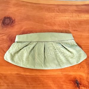 Fossil leather clutch botanical leaf design